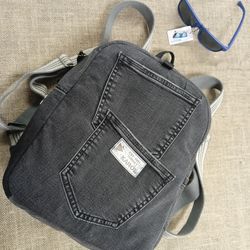 casual unisex denim backpack made from recycled jeans, with 6 pockets