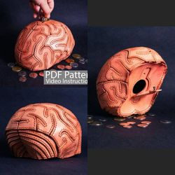 Pattern of a leather piggy bank in the shape of a brain