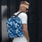 all-over-print-backpack-white-front-66426e638cf1e.png