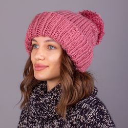 Elongated hat with an edge. Lingonberry color