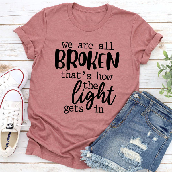 We're All Broken That's How The Light Gets In T-Shirt (1).jpg