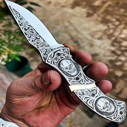 handmade engraving pocket knife with skull heads..!!!!!!