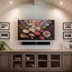 frametv an exquisite close-up of a painting featuring vibrant, detailed flowers, skillfully crafted in the folk art