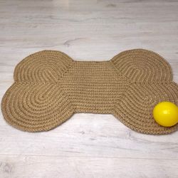 jute pet rug in the form of a bone mat under pet bowls pet mat