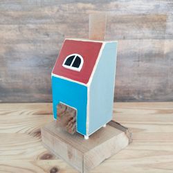 miniature wooden incence house