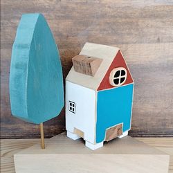 miniature wooden incense house and tree