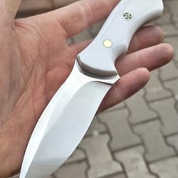 premium blacksmith made camping knife with 1075 carbon steel & white corian grip
