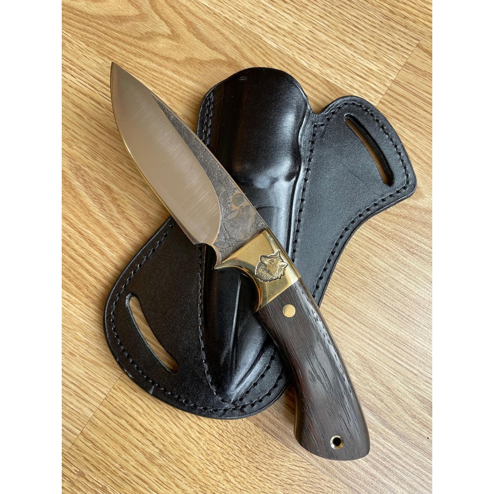 Premium Hunting Knife With Wolf Engraved Blade Ebony Handle Brass Bolsters 1