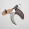 Karambit Knife Black And Silver Handle Damascus Steel Blade Sleek TwoTone Design For A Premium L 0