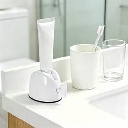 easyroll toothpaste dispenser & tube squeezer holder for neat bathroom organization