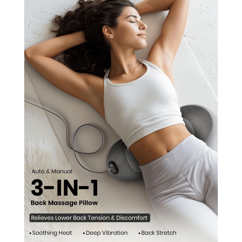 Office worker relaxing on portable back massager for posture correction and sciatica pain