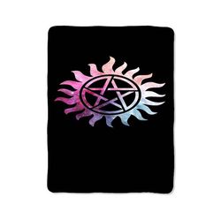 supernatural logo inspired print on blanket