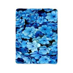 blue flowers design on blanket