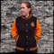 Seasonal womens jacket with varsity letterman style and festive Halloween flair