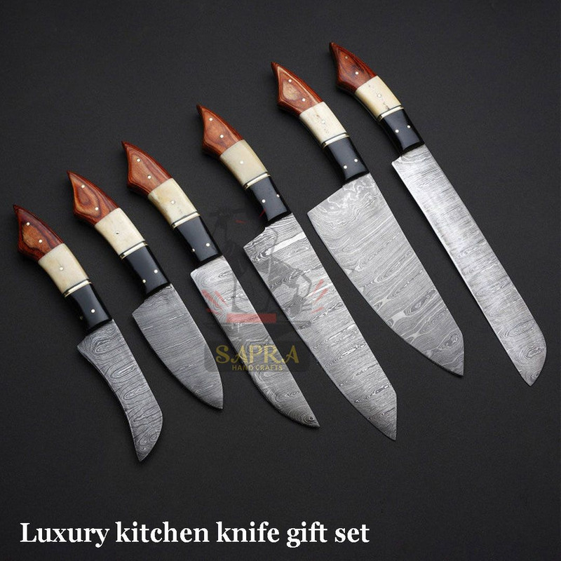 Handcrafteddamascussteelkitchenknifesetleatherrollbag 1