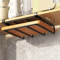 Wallmounted kitchen storage shelf with hooks