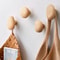 Scandinavian Solid Wood Wall Mounted Clothes Hook Pebble Shape Punch Free Door Hanger 11