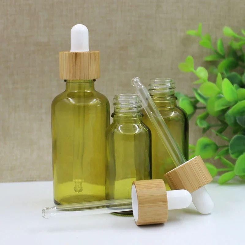 Olive Green Glass Dropper Bottle Refillable Travel Container For Essential Oils And Cosmetics 1