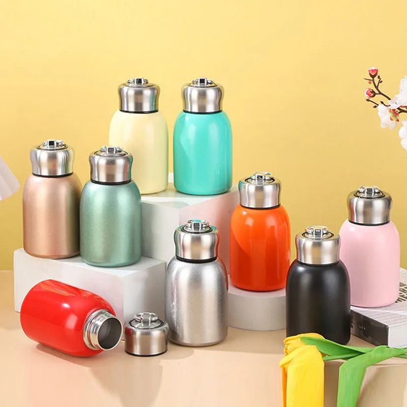 Mini Stainless Steel Travel Thermos Mug With Lifting Ring For Hot And Cold Drinks 1