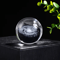 crystal ball photography lens capturing inverted landscape