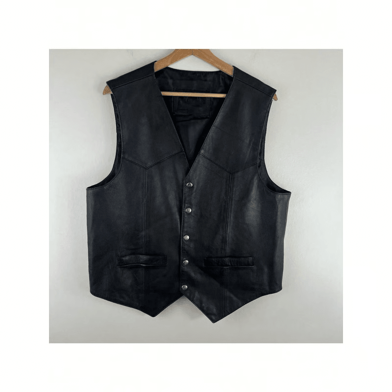 western leather vest layered on flannel