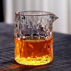 transparent uneven hammer pattern glass fair cup