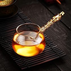 transparent gilded side handle glass tea dispenser fair cup