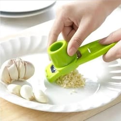 creative green mini garlic grinder | manual garlic press & mashing gadget