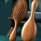 Luxurious Sandalwood Air Cushion Comb Artisan Scalp Massaging Hairbrush 0
