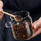 Artisan Borosilicate Glass Storage Jar With Integrated Wooden Spoon 2