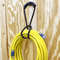 HandleHang MultiUse Storage Strap With Handle For Extension Cords Hoses SpaceSaving Organization 2