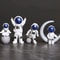 4Piece Astronaut Figurine Set SpaceThemed Desk Decor Educational Toy 0
