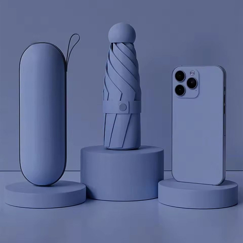 Portable Mini Umbrella With UV Coating And Reinforced Ribs For Sunny And Rainy Days 1