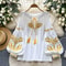 Women Vintage Ethnic Style Embroidered Blouse With Lace Up Neck And Lantern Sleeves 0