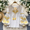 Women Vintage Ethnic Style Embroidered Blouse With Lace Up Neck And Lantern Sleeves 3