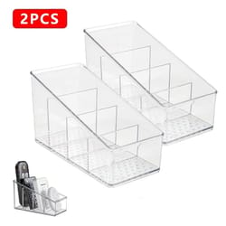 clear desktop organizer box with four compartments for remote phone and cosmetics