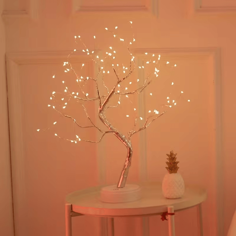 Fairy Light Tree Lamp glowing in a peaceful bedroom setting