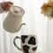 Cute Cow Pattern Ceramic Footed Mug 4