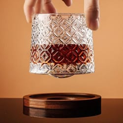 rotating crystal whiskey tumbler – high-performance spinning spirits glass with centrifugal aeration base
