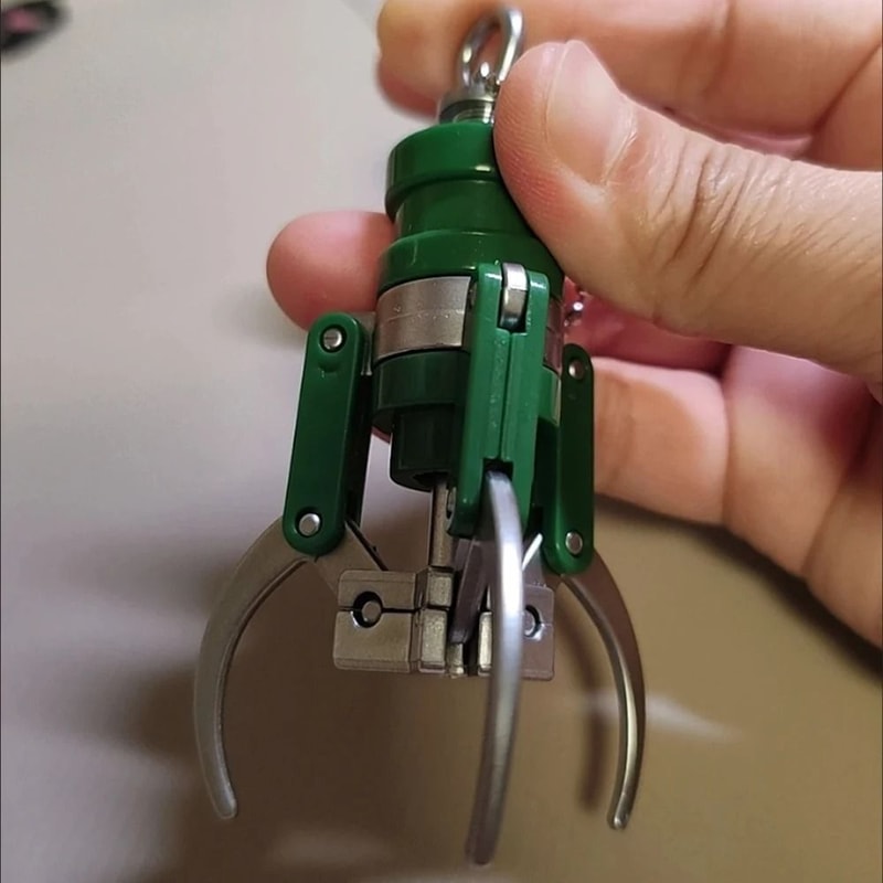 Creative Mini Doll Machine Claw Keychain Fingertip Gripper Bag Pendant 2