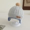 PompomKinetic Earflap Beanie Premium Windproof Knitted Hat For Infants 9