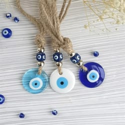 handcrafted blue evil eye charm | glass nazar wall hanging | executive protection & sanctuary home decor