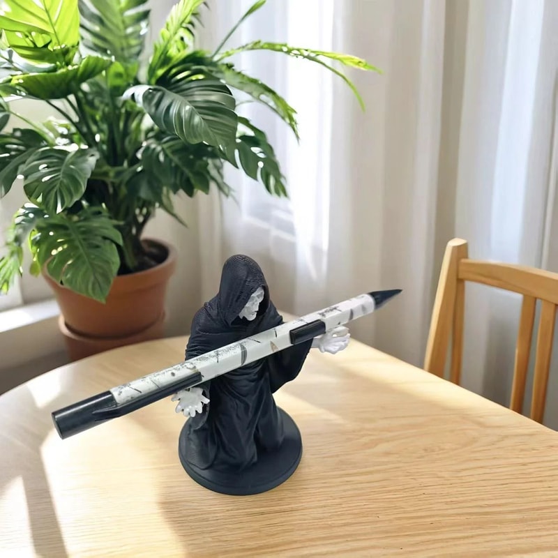 The Reaper Kneeling Pen Holder HighFidelity Desktop Sculpture Satirical Stationery Display 1