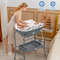 4-in-1 Folding Baby Changing Table with Bathtub & 4 Universal Wheels