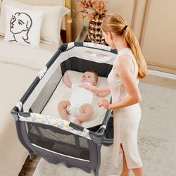 4 in 1 portable pack and play baby nursery center with bassinet multi functional playpen & changing table