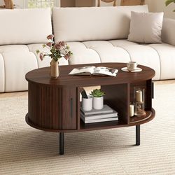 modern oval coffee table with open compartment & stylish sector shelves