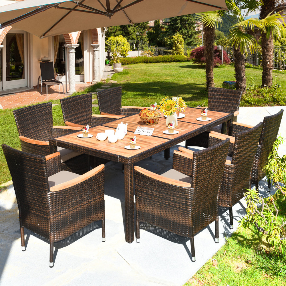 9 Piece Rattan Dining Set with Acacia Wood Table & Stackable Cushioned Chairs for Outdoor Gatherings