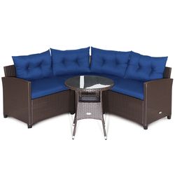 outdoor patio rattan furniture set, cushioned sofa seating with tempered glass table for balcony, deck, or gardem