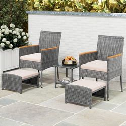 outdoor 5-piece rattan furniture set, armchairs, ottomans & glass side table