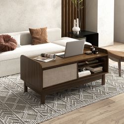 modern coffee table with storage, woven sliding doors, mid century design, multi functional center table for small space